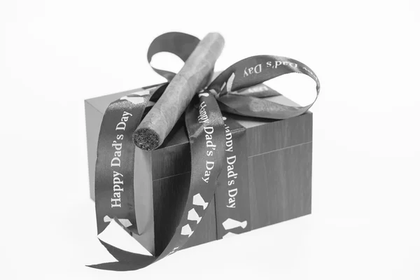 Happy Father's Day with a gift box and cuban cigar in black and white — Stock Photo, Image