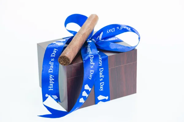 Happy Father 's Fay with a gift box and cuban cigar — стоковое фото