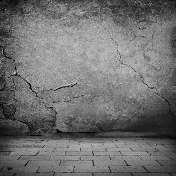 Negro y blanco grunge fondo viejo piedra pared textura y acera ladrillos fondo urbano —  Fotos de Stock