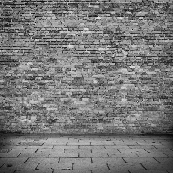 Grunge fondo ladrillo pared textura blanco y negro acera abandonado edificio urbano fondo para el diseño de interiores — Foto de Stock