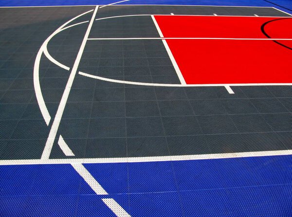 Detail of basketball and volleyball outdoor sports tile ground