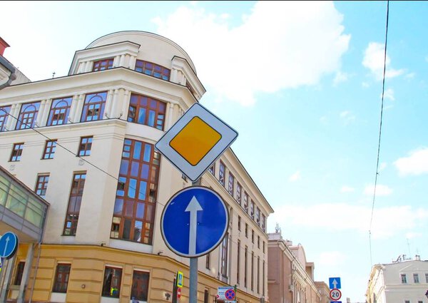 Road sign Main road, Road signs in Moscow, yellow diamond. Straight ahead, up arrow