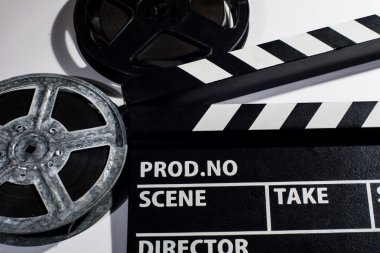 Sinema, metal veya plastik alkış makara film