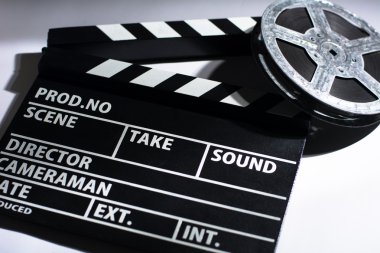 Hafif bir arka plan üzerinde film alkış.