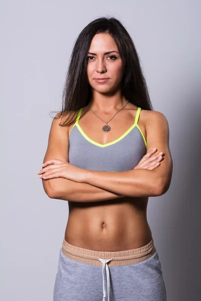 Beautiful young sporty muscular woman — Stock Photo, Image