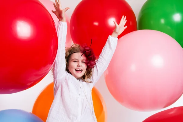 Schastivaya joyful girl on a large balloons — Stock Photo, Image