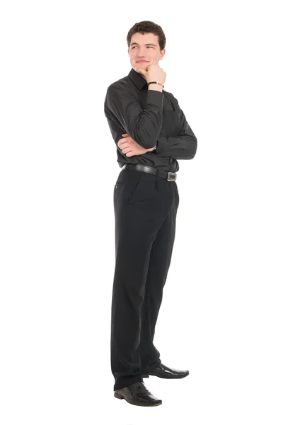 Young businessman standing in full length looking away — Stock Photo, Image