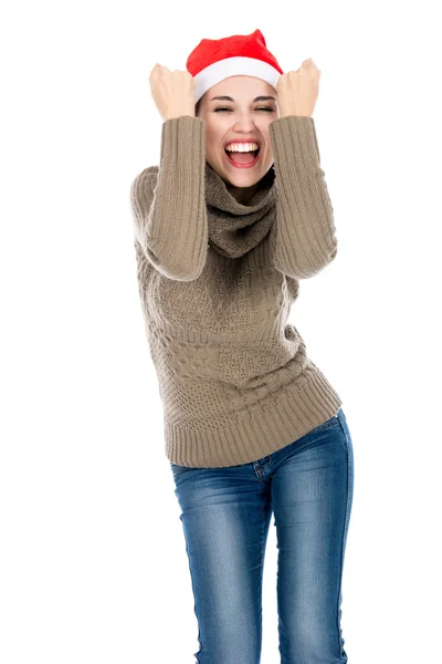 Excited young woman in a sweater clenching his fists — Stock Photo, Image