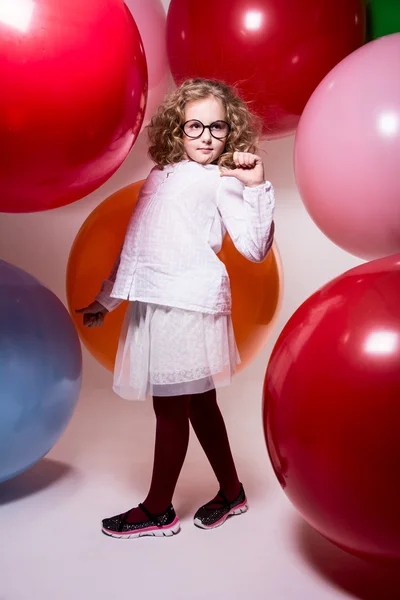 Teenager in glasses full-length shows thumb. — Stock Photo, Image