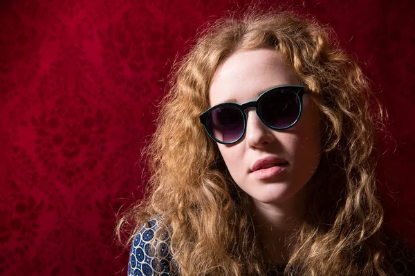 Close-up portrait of beautiful pensive girl with curly hair wear — Stock Photo, Image