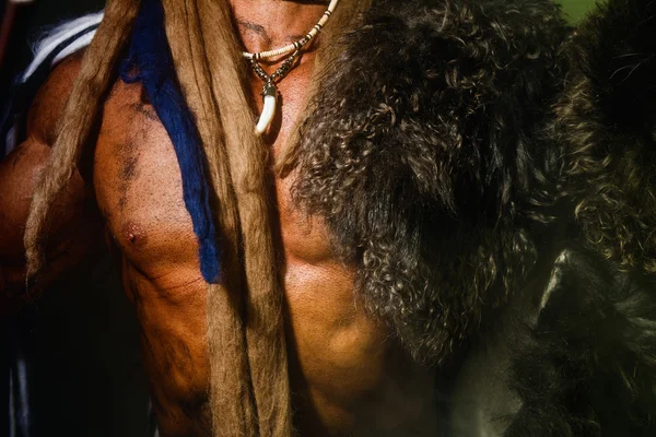 Close up torso of a strong man with a skin on his shoulder — Stock Photo, Image