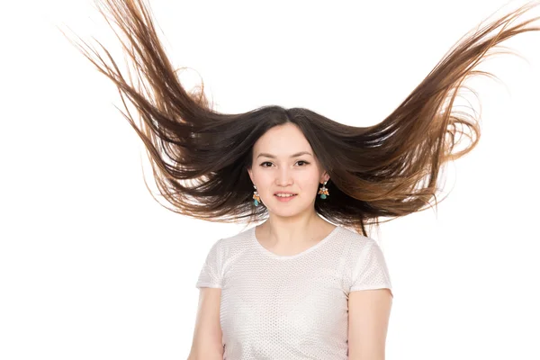 Asian brunette girl with long hair. — Stock Photo, Image