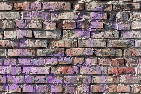 Old brick wall background with elements of paint. — Stock Photo, Image