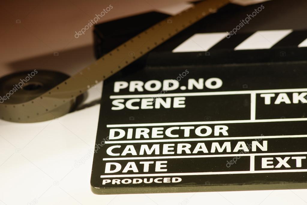 Movie clapper with 16 mm film. Preparations for shooting movie