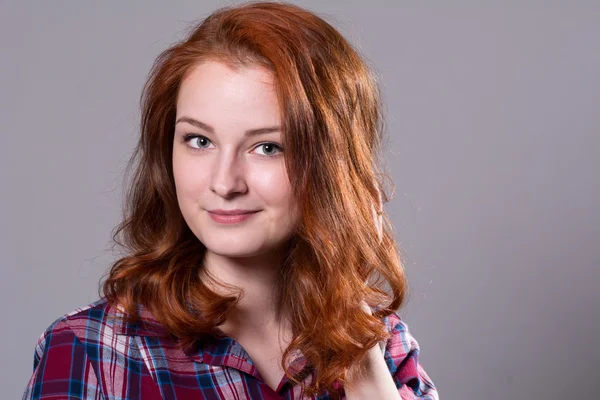 Close-up portrait of a beautiful red-haired girl fun — Stock Photo, Image