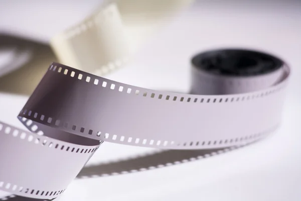 Close-up reel with a negative film. Copy space for announcement — Stock Photo, Image