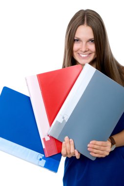 Cheerful girl in a blue dress with folders for documents