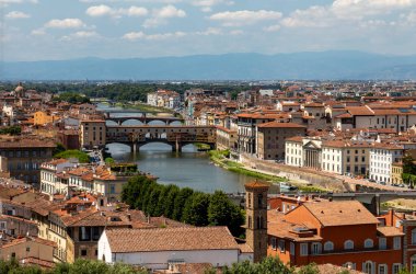bridges over the arno river at florence tuscany italy elevated view from the piazzale michelangelo sunny summer day no people