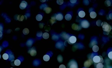 Bokeh pastel arka planının soyut hali. Bokeh ışığı. Çok renkli soyut arkaplanda parıldayan bulanık spot ışıkları