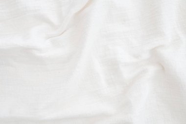 Kumaş perde arkası Beyaz keten branda buruşmuş doğal pamuk kumaş doğal el yapımı keten üst arkaplan Organik eko kumaş beyaz kumaş dokusu