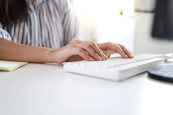 Hands typing on  keyboard. writing a blog. woman hands on the keyboard Working at home. hand are in finger typewriter