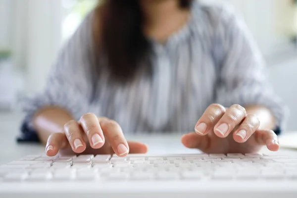 Hands typing on  keyboard. writing a blog. woman hands on the keyboard Working at home. hand are in finger typewriter
