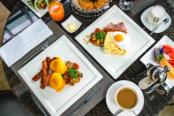 Full American Breakfast Huge healthy breakfast spread on a table with coffee Breakfast served with coffee English breakfast fried egg croissants