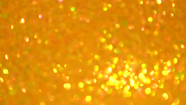 Fondo amarillo festivo con lentejuelas y pedrería — Vídeos de Stock