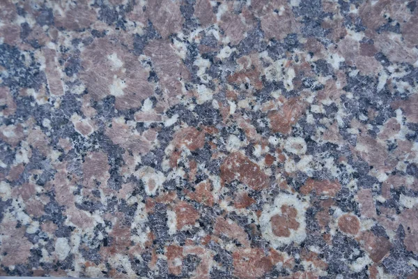 Polished marble and granite tiles, texture of stone, background