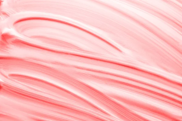 La textura decorativa de la base de crema rosa está hecha con un pincelazo artístico. Primer plano. Líneas diagonales —  Fotos de Stock