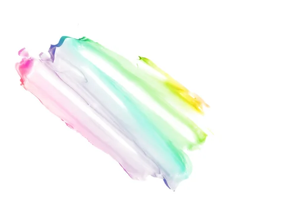 The smear and texture of the cream. The color of the rainbow, isolated on a white background. An element for cosmetic beauty design. — Stock Photo, Image