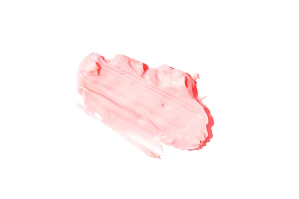 Krämens utstryk och konsistens. Rosa färg isolerad på en vit bakgrund. Ett element för kosmetisk skönhetsdesign. — Stockfoto