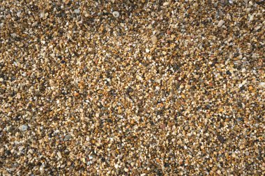 Açık kahverengi renkli, kirli, desenli bir arka plan. Boşluğu kopyala.