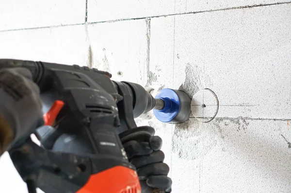 rotary hammer drills holes for outlets