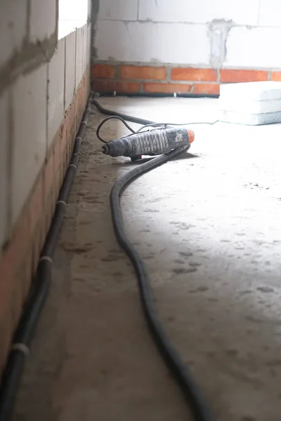 Construction Worker Drilling Hole Repair House — Stock Photo, Image