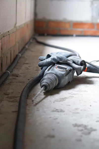 Construction Worker Drilling Hole Repair House — Stock Photo, Image