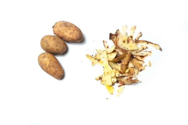 White Background Next Lies Potatoes Peel — Stock Photo, Image