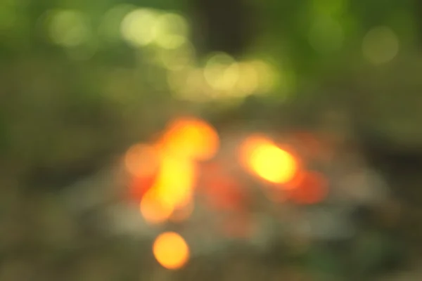 Yeşil arkaplanda soyut parlayan ışık — Stok fotoğraf