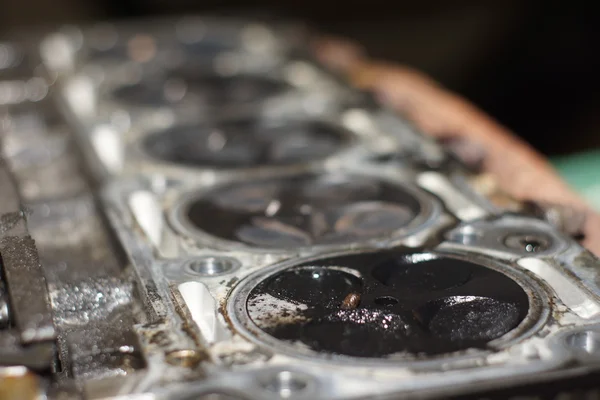 Mechanic hands tighten nut with wrench while repairing engine — Stock Photo, Image