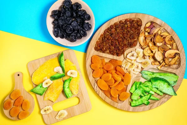 Mix of dried fruits Top view. Symbols of judaic holiday Tu Bishvat. Thanksgiving Day. Flat lay. mango, raisins, papaya, bananas, dried apricots