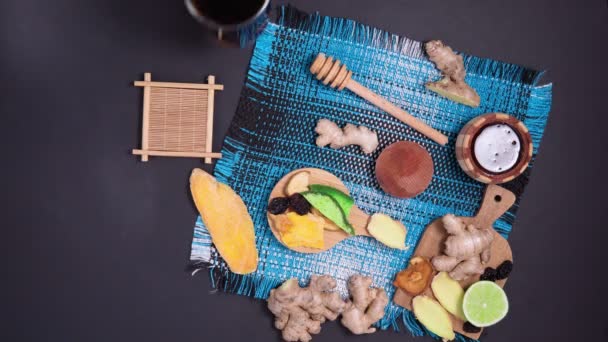 Tea ceremony, healthy snacks drink line honey ginger raw root. Dry ginger. flat lay. — Stock Video