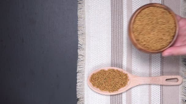 Fenugreek Seeds have medicinal properties close-up. selective focus. flat lay — Stock Video