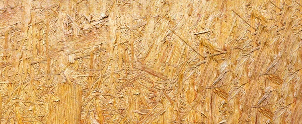 Osb Jsou Vyrobeny Hnědých Dřevěných Štěpků Rozdrcených Dřevěné Pozadí Pohled — Stock fotografie