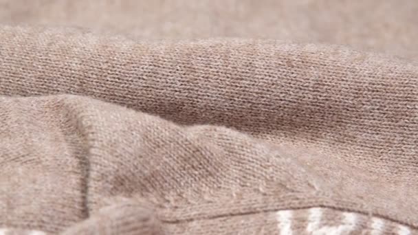 Jaqueta de lã tecido close-up macro. controle deslizante, movimento da câmera — Vídeo de Stock