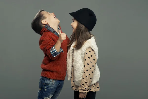 A portrait of a laughing girl and a smiling boy. Autumn style — Stock Photo, Image