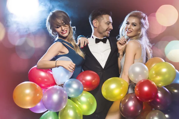 Happy young people celebrating new year's eve — Stock Photo, Image