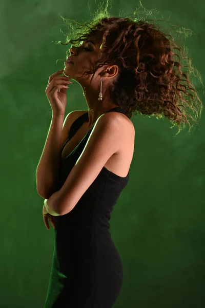 Portrait of a beautiful natural young African woman with afro. Elegant woman on colorful background — Stock Photo, Image