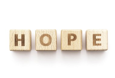 Umut ve inanç konsept resim beyaz izole ahşap küpleri tarafından kelime umut ve inanç hakkında