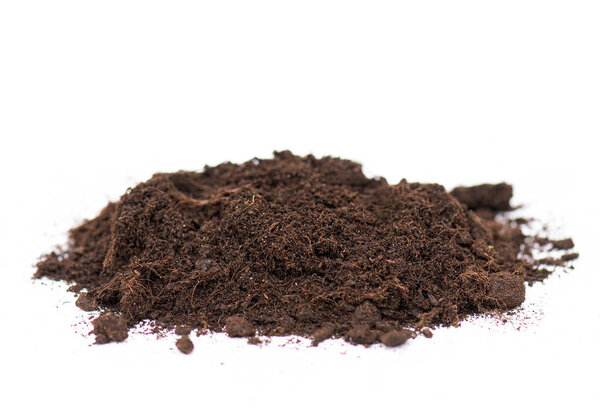 Pile of soil or ground isolated on white. Ground as texture or background. 