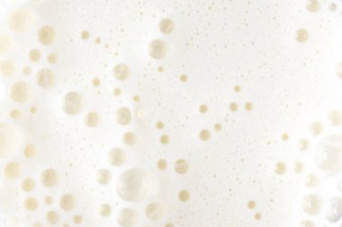Köpüklü milkshake, köpüklü kokteyl doku veya arka plan olarak, üst görünüm